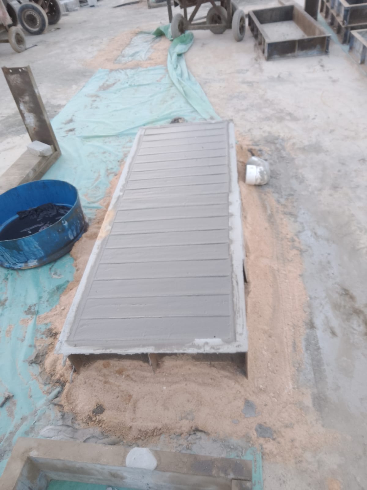 Foam concrete blocks being manufactured in molds